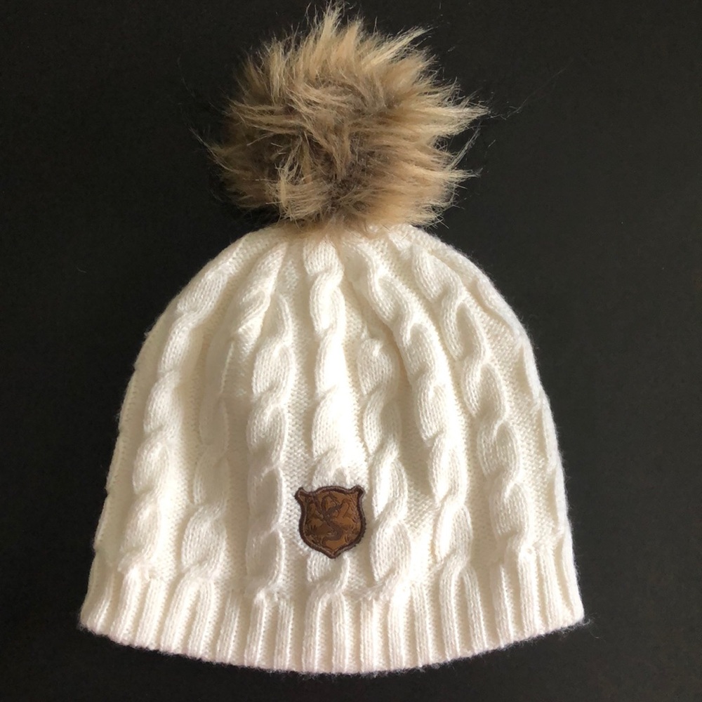 Pilatus cream colored pompon beanie